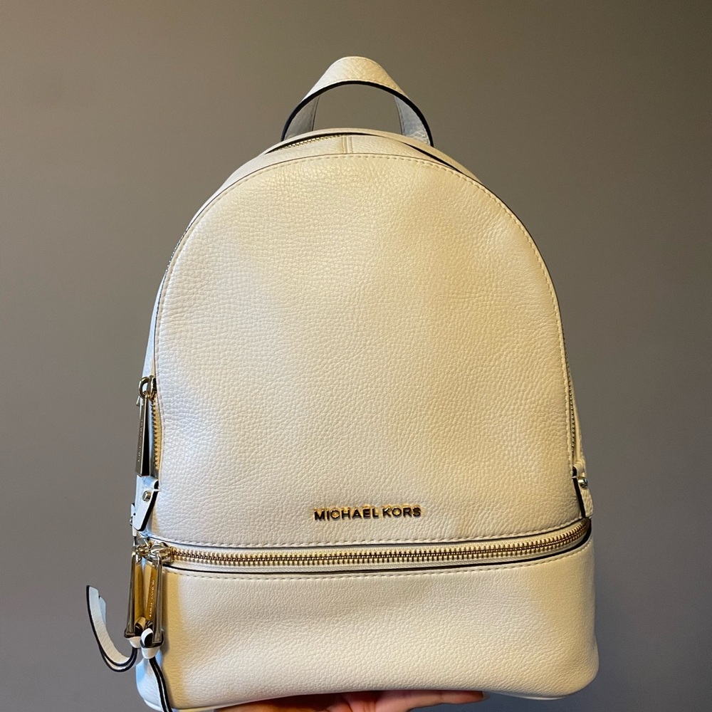 Michael Kors Cream Backpack with Silver Accents and Dome Shape